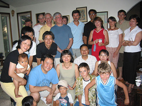 Dr. Cramer with lab people and their families